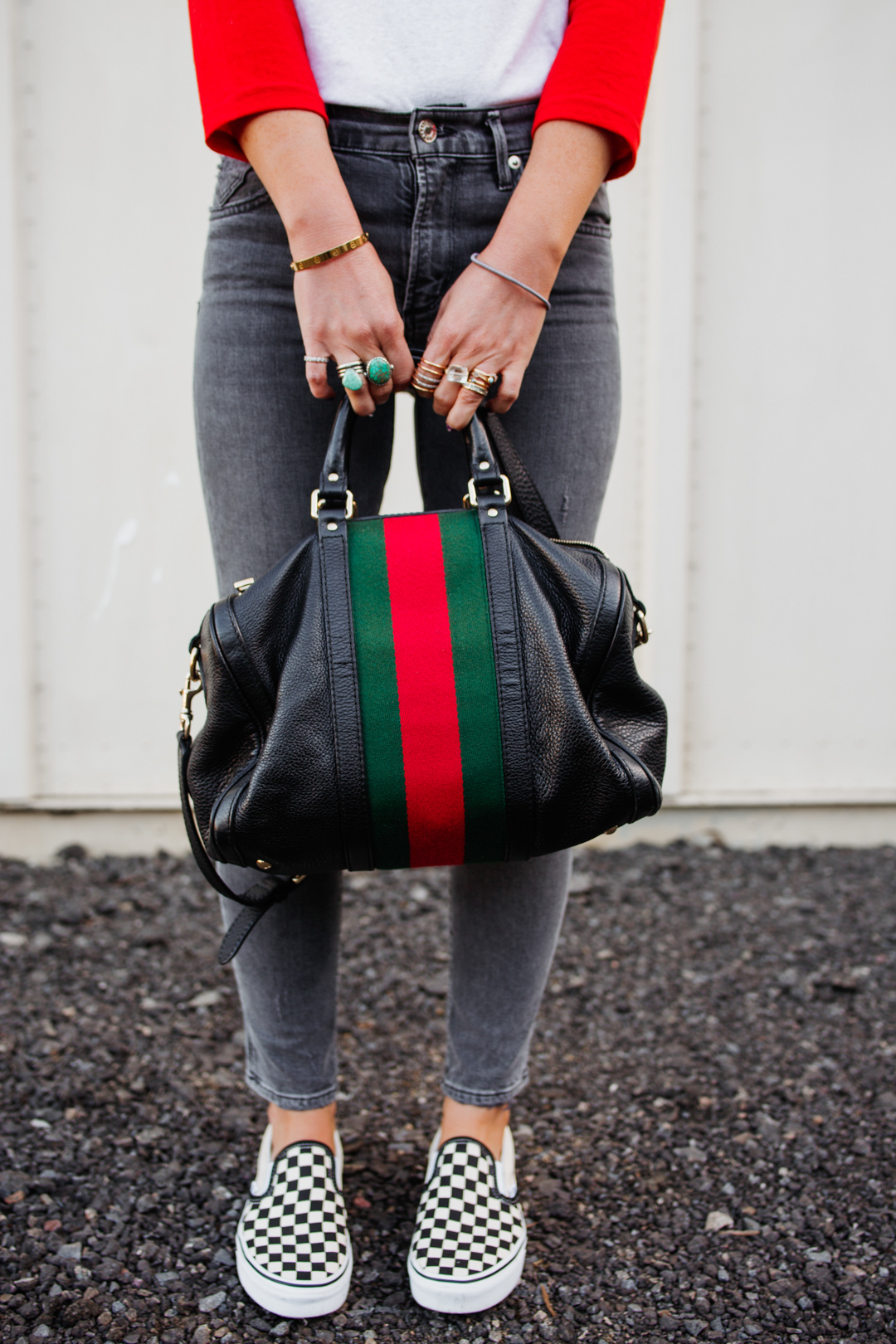 lisa allen of salty lashes with her black gucci boston bag | Tops and Tees Under $50