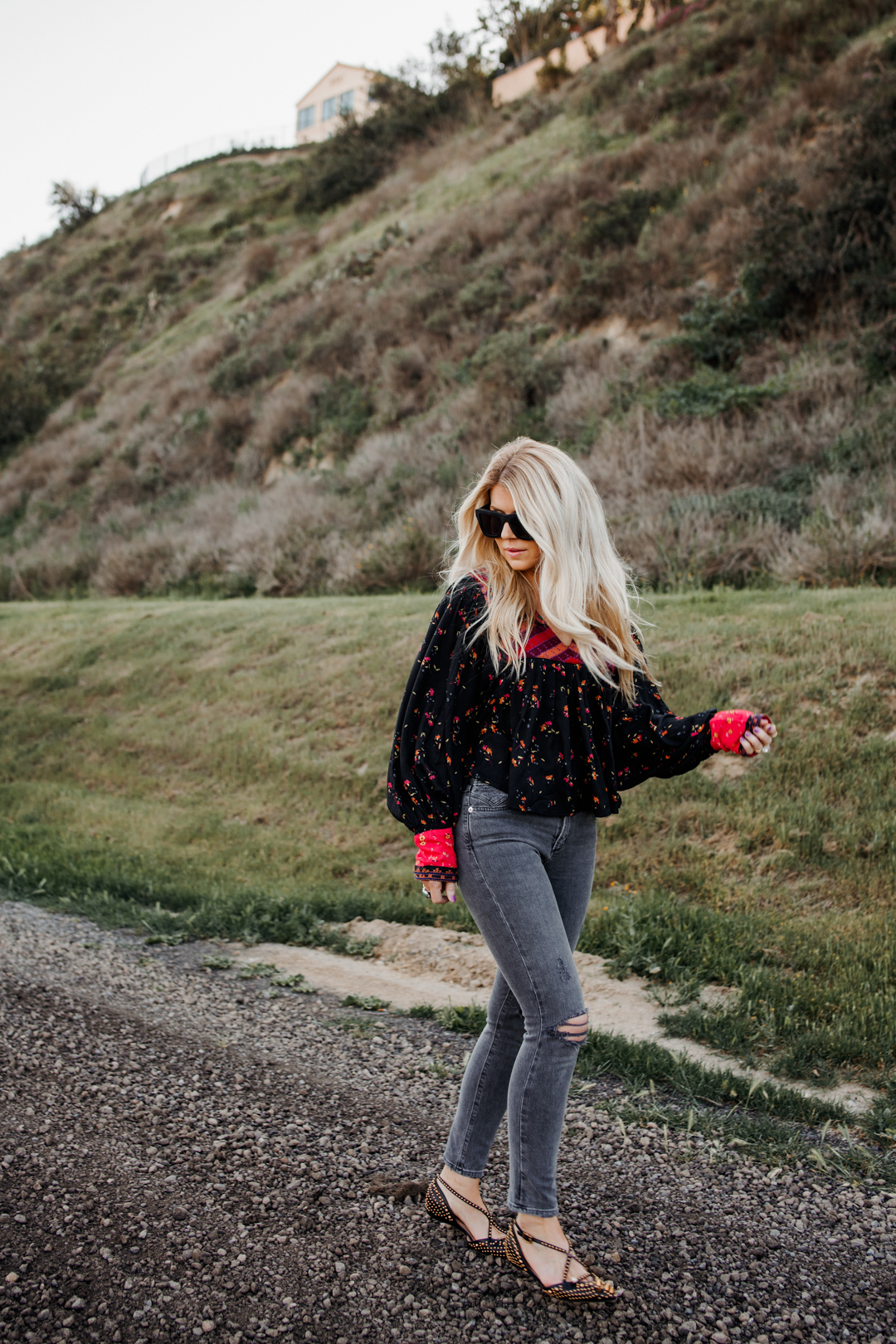 Lisa Allen wearing AGOLDE with Valley Eyewear and Free People and Gucci Flats in Del Mar California for weekly rewind