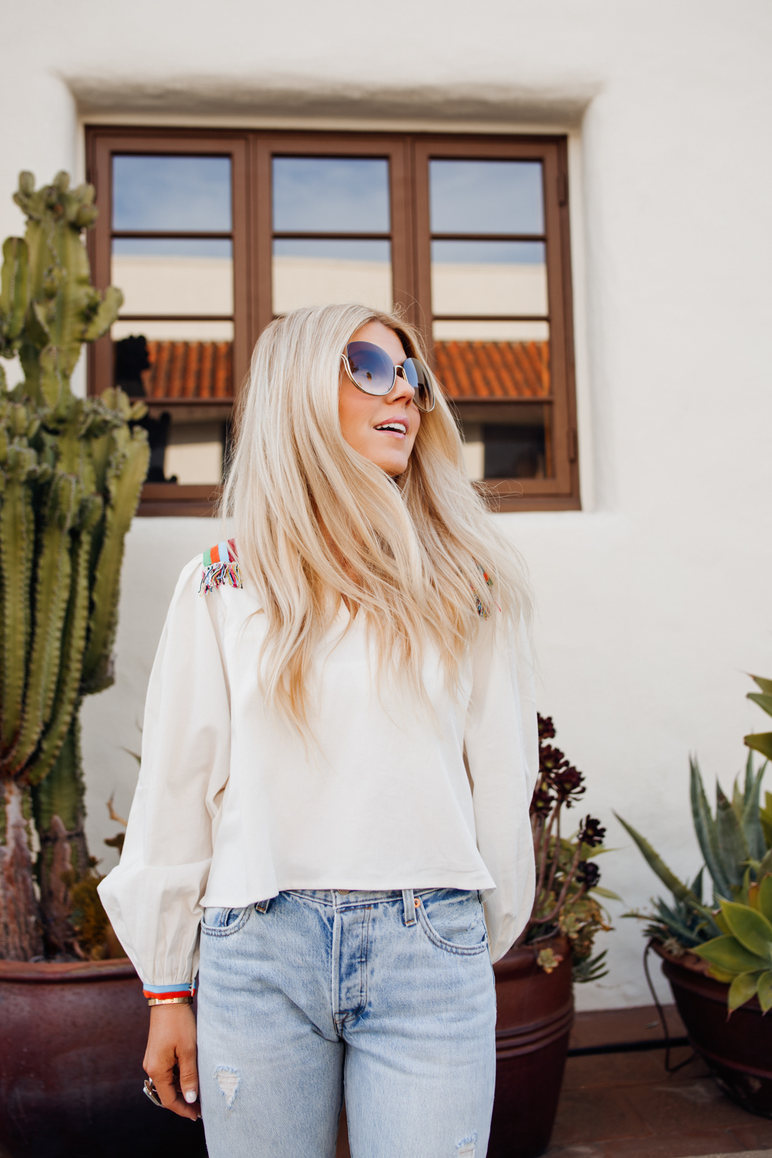 lisa allen of salty lashes getting to know us in urban outfitters, levi's, chloe and Anthropologie sandals