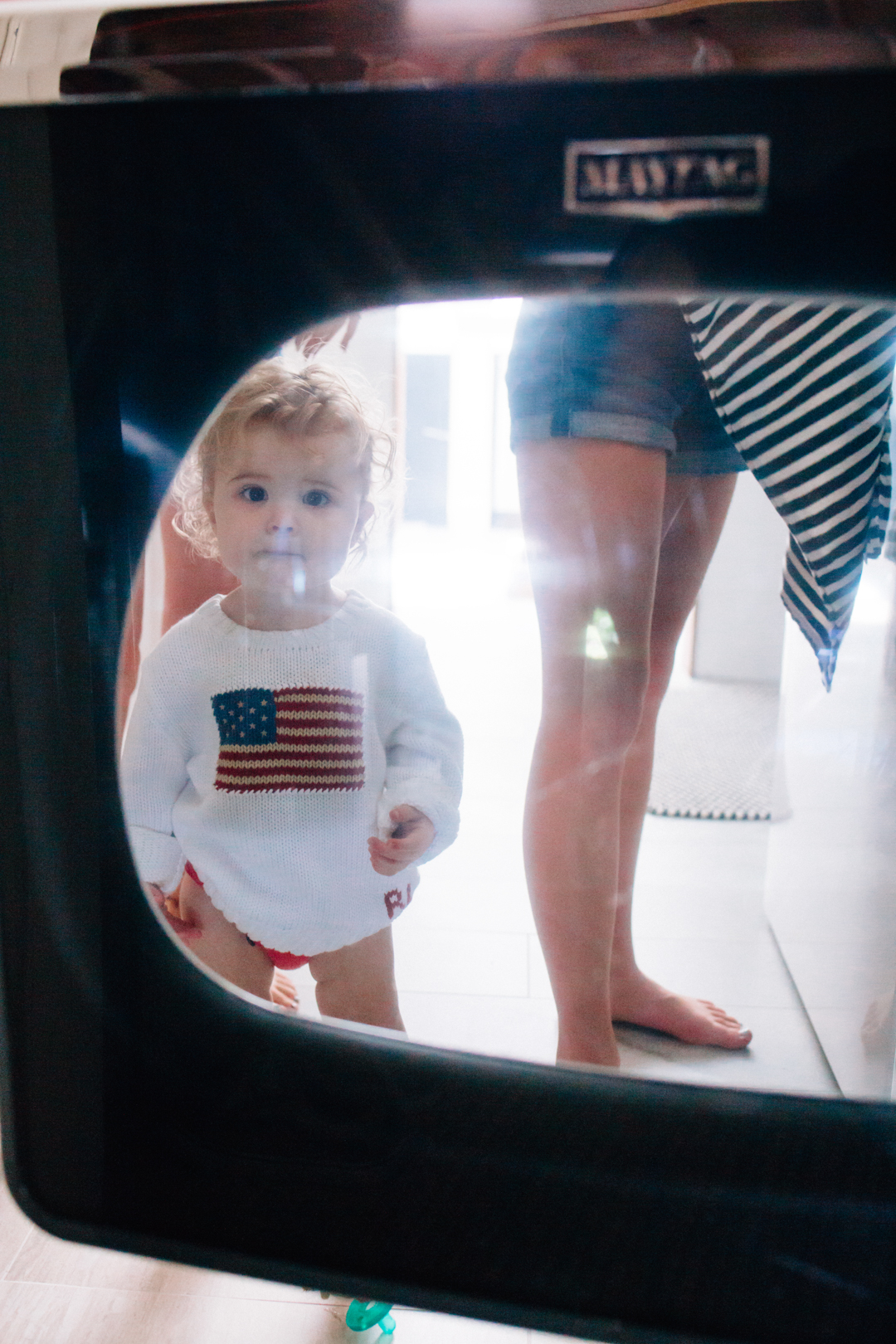 toddler in the mirror