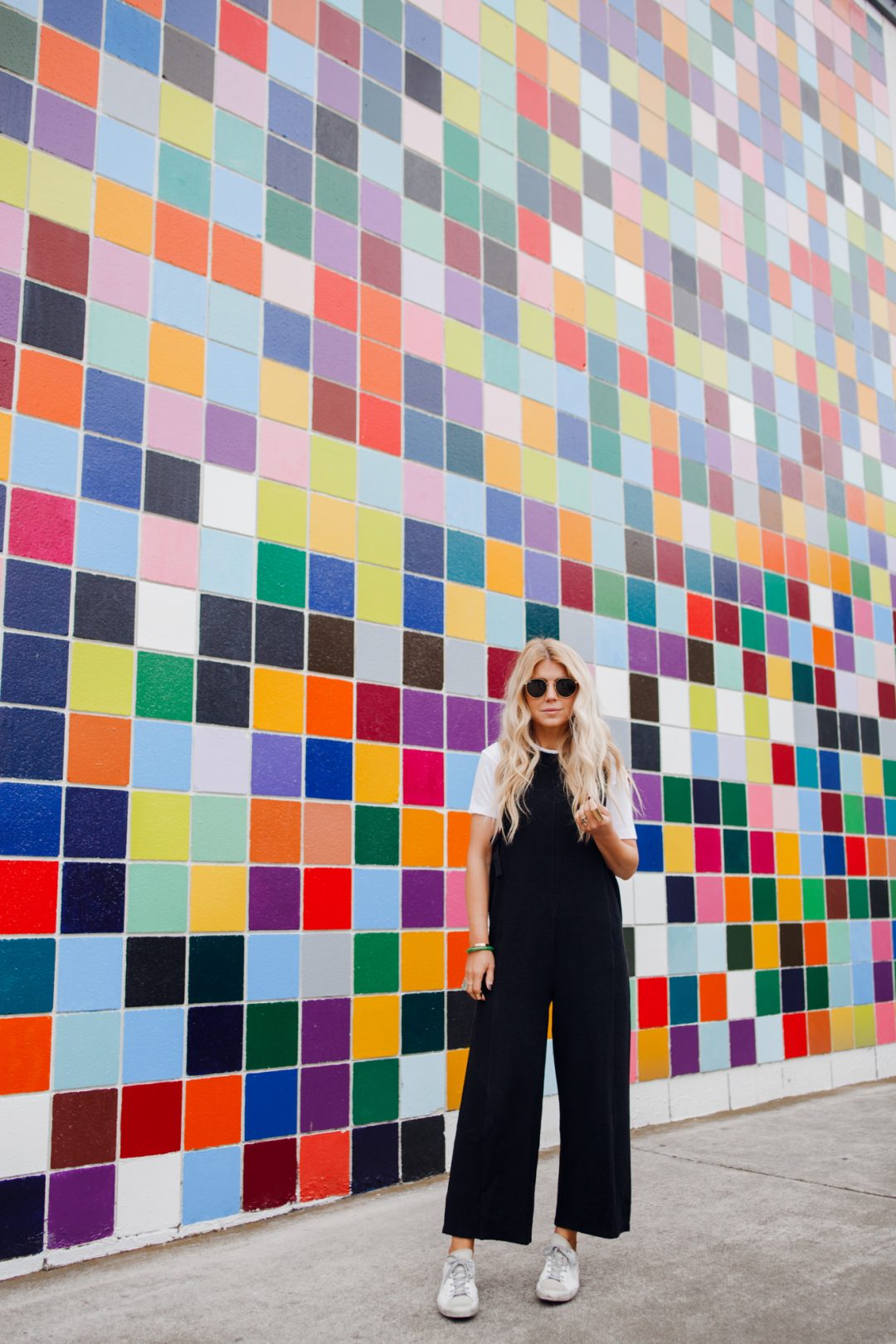 lisa allen of salty lashes wearing a screw white bodysuit with anthropologie jumpsuit and fendi kan I bag in la jolla california - jumpsuits