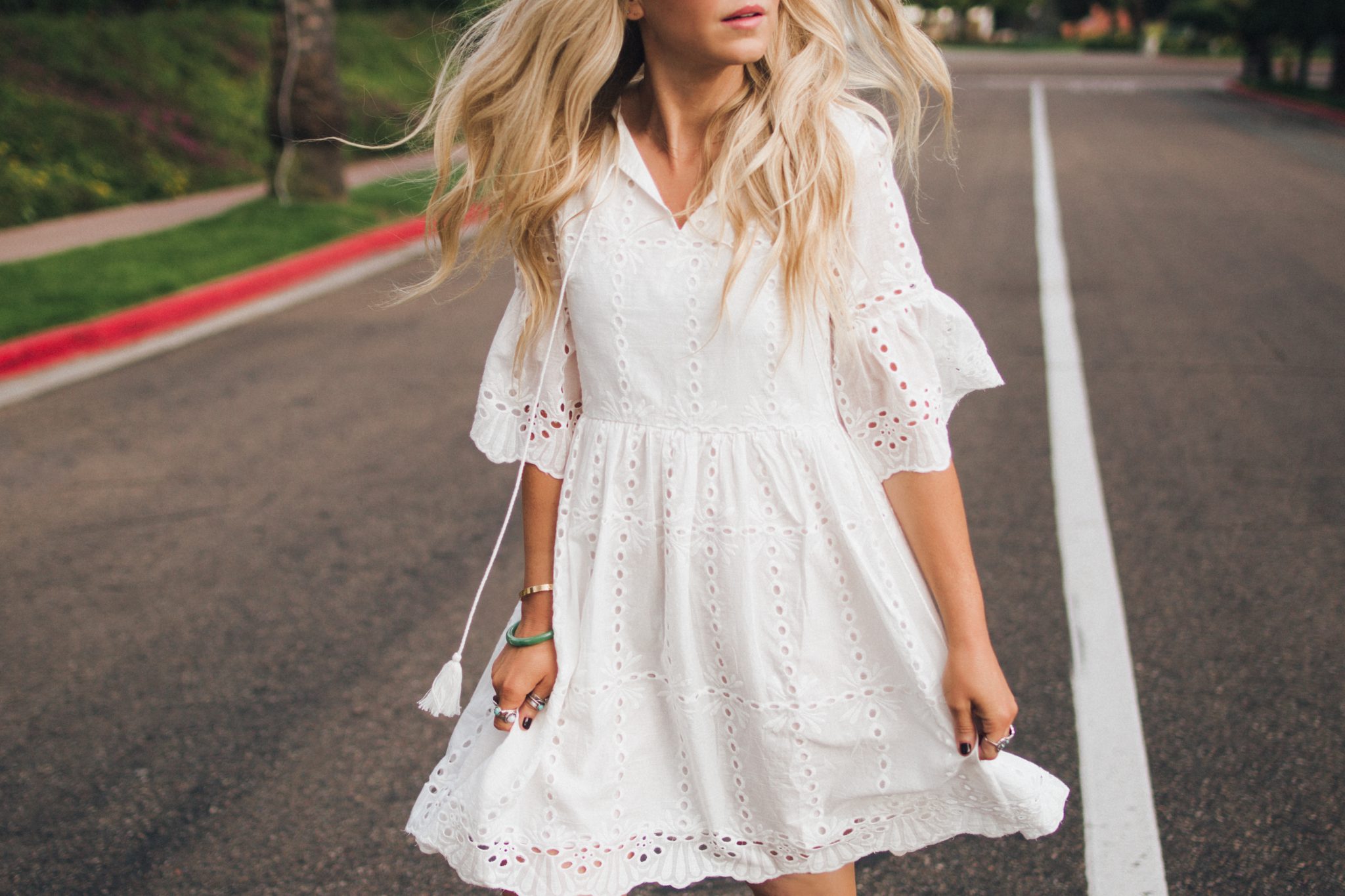 lisa allen of salty lashes wearing a white eyelet dress from SheIn with lespecs - Dresses Under $50