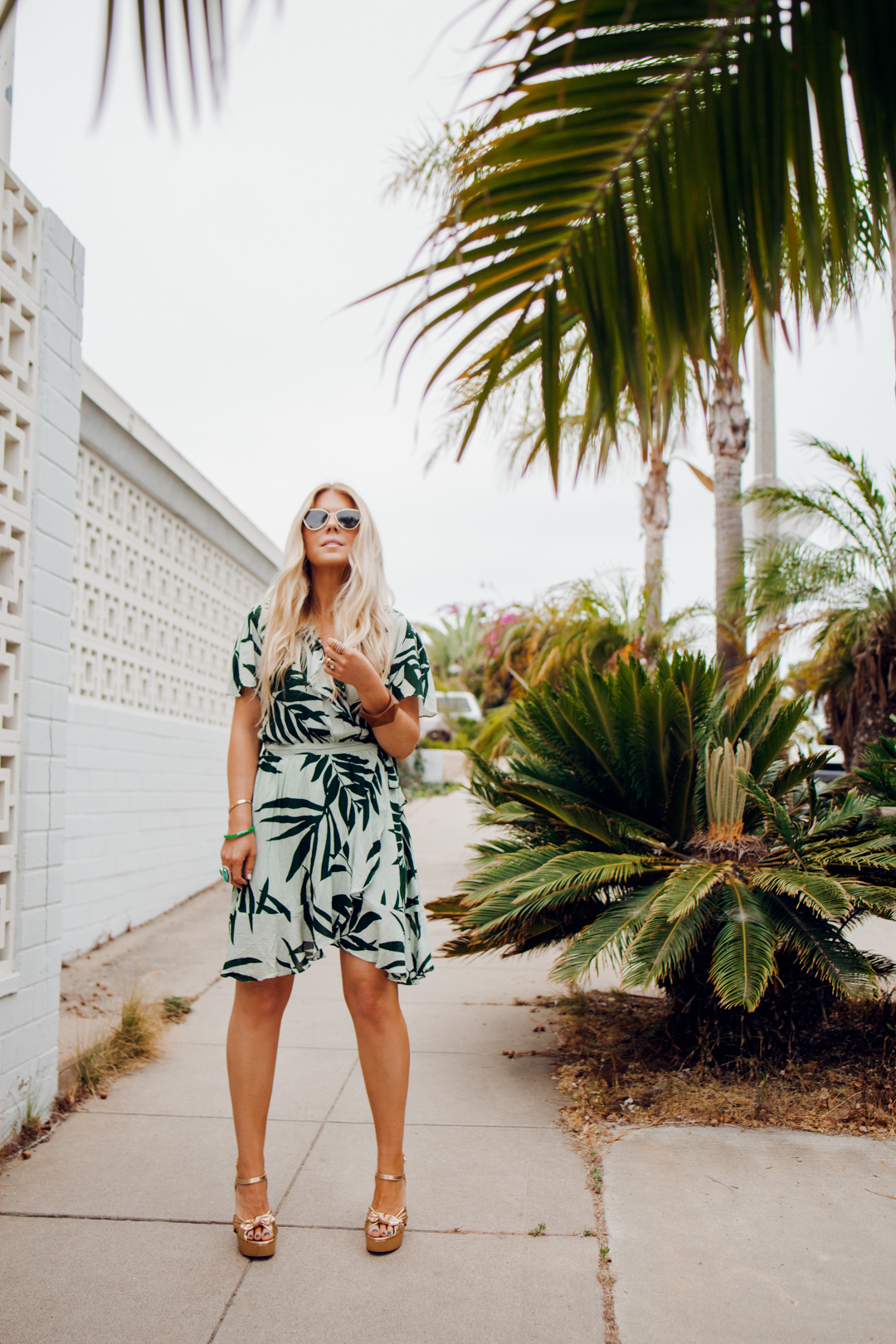 lisa allen of salty lashes wearing a michael stars dress with michael kors heels