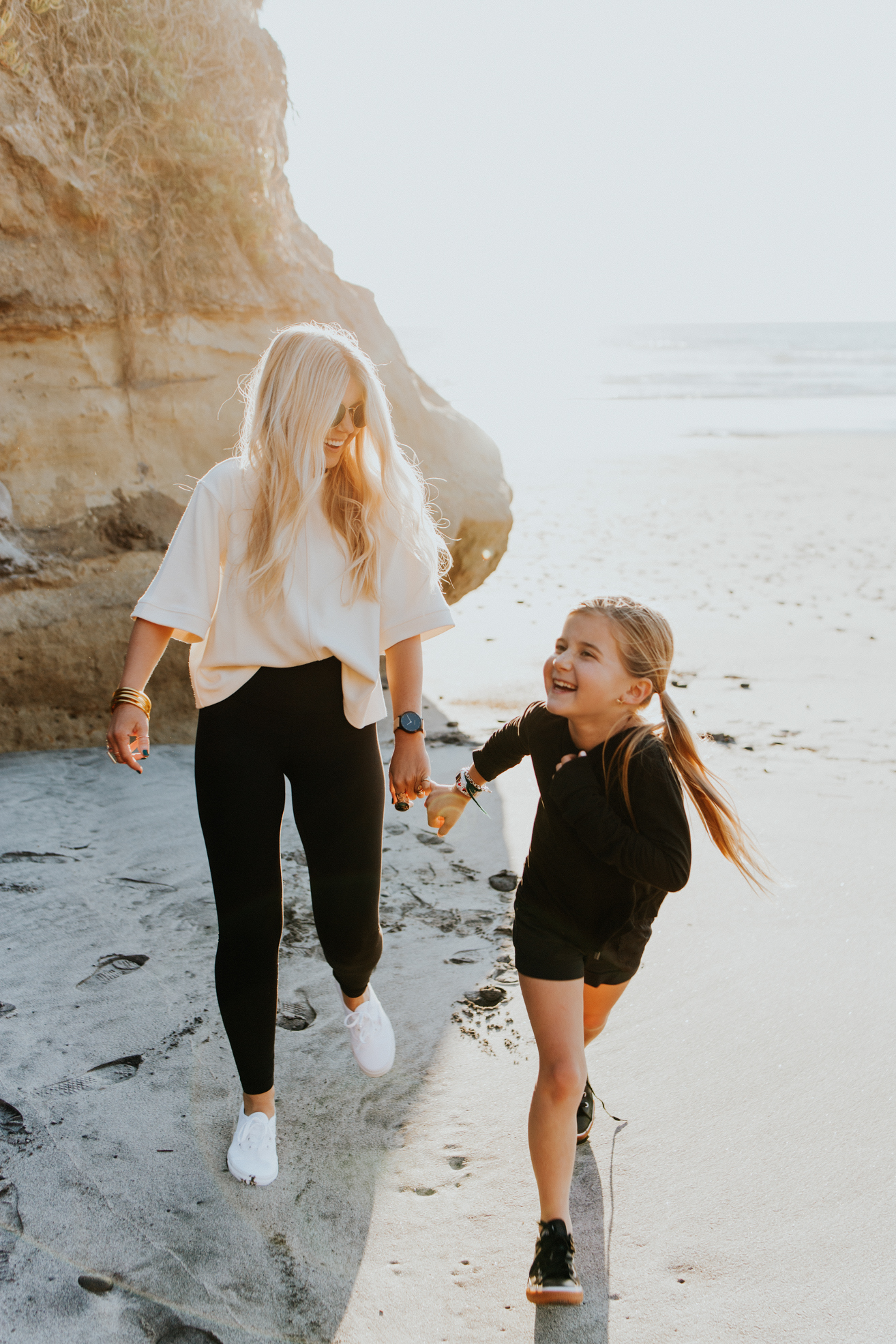 Lisa Allen and Goldie wearing their Garmin Fitness Trackers