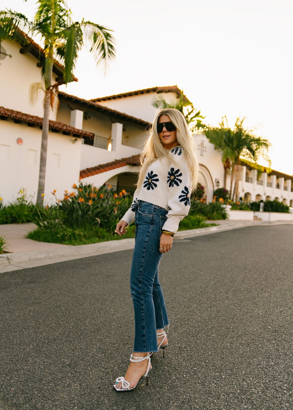 woman wearing sweater and jeans