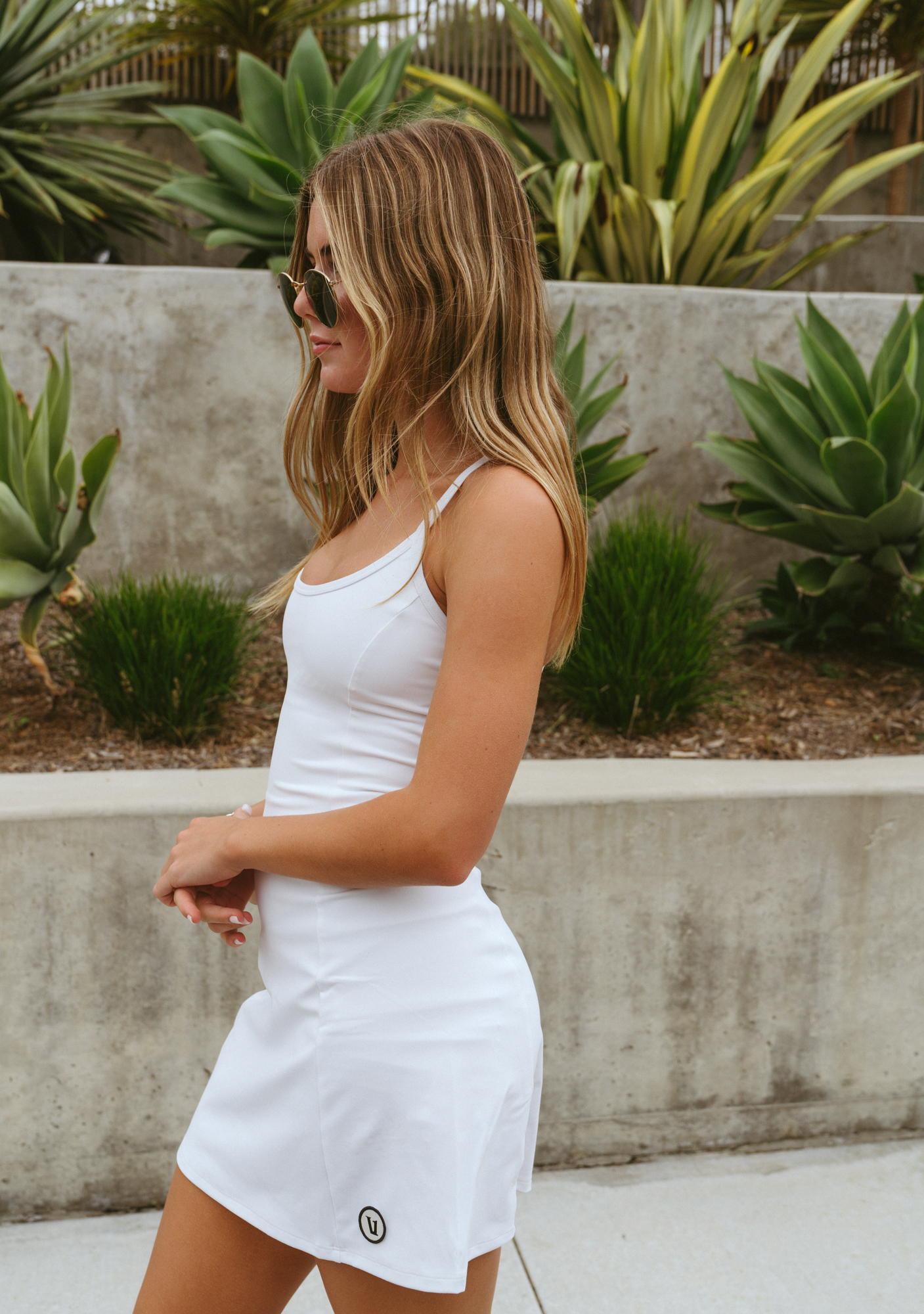 woman in all white outfit from Summer with Vuori