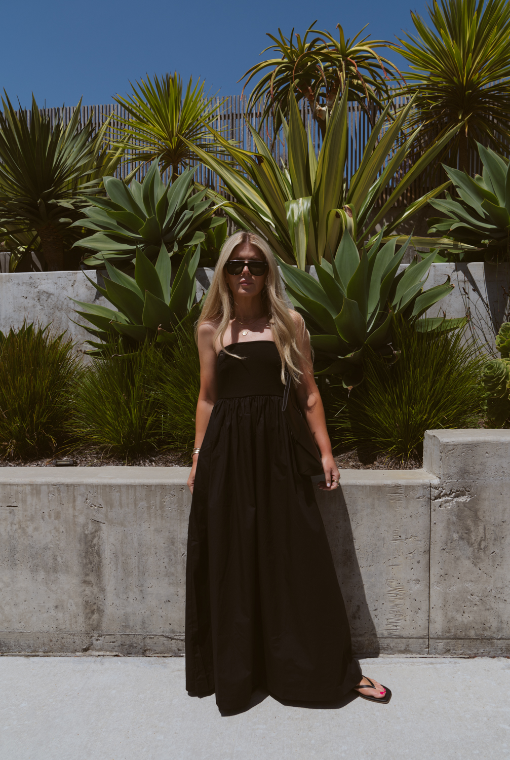 Salty Lashes Blogger Lisa Allen wearing black tube dress from New Arrivals with Walmart