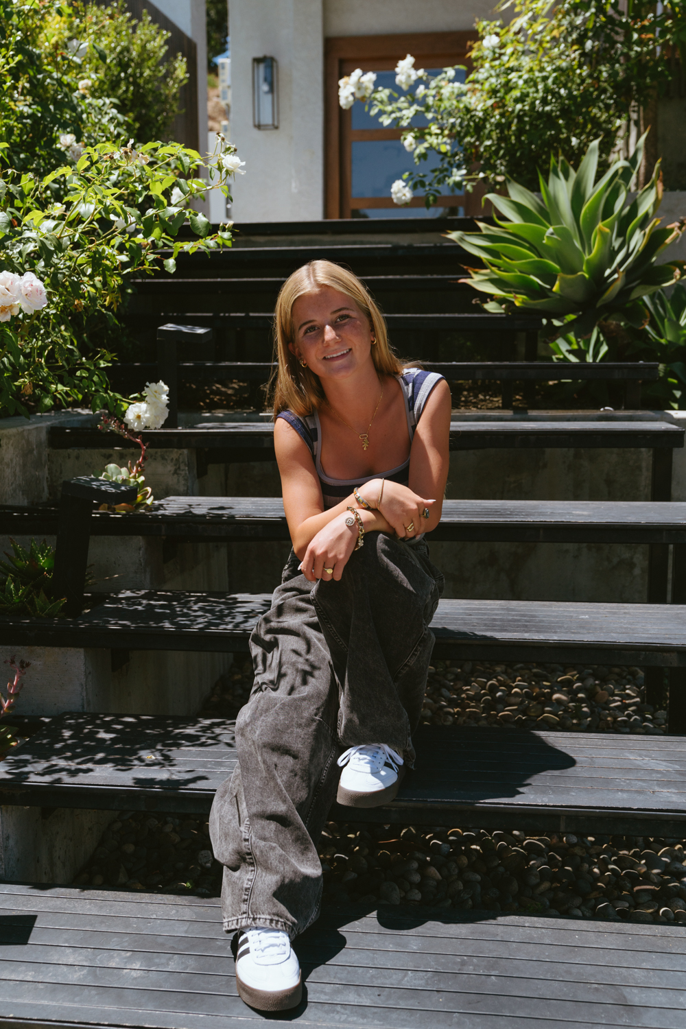 Salty Lashes Blogger Lisa Allen shares UO Back To School In BDG - in photo: woman sitting on the stairs