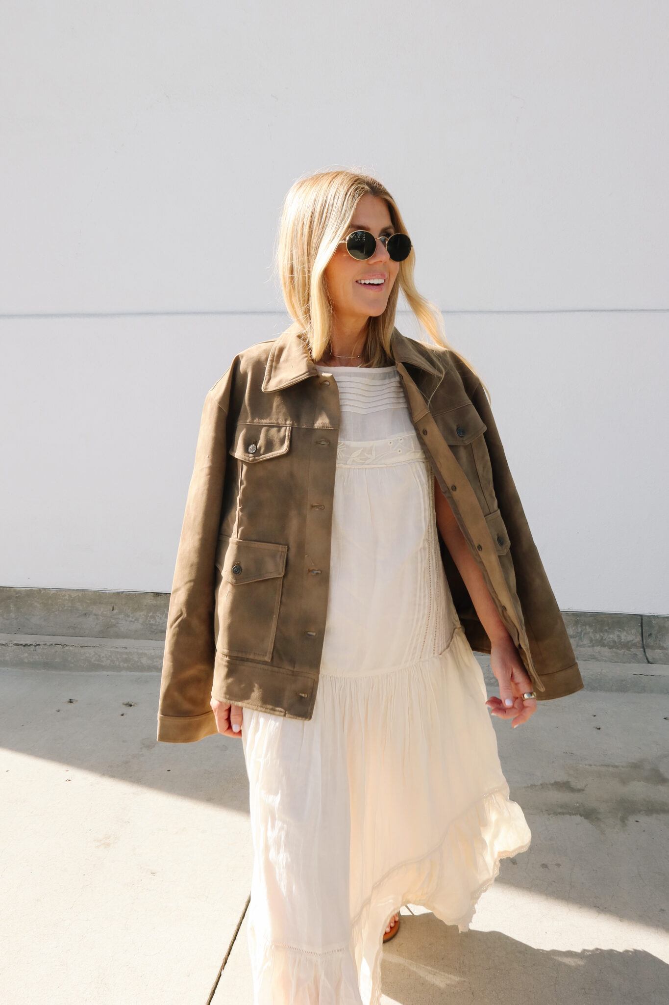 Salty Lashes Blogger Lisa Allen - in photo: Lisa wearing a dress and brown jacket