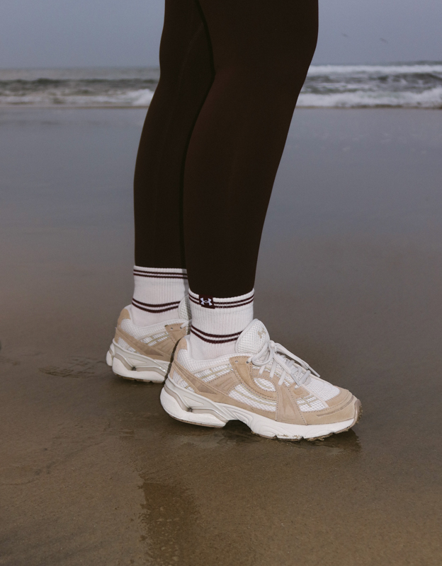 Salty Lashes wearing Sola Suede Sneakers and Sportstyle Cotton Socks and Motion Full Length Tights.