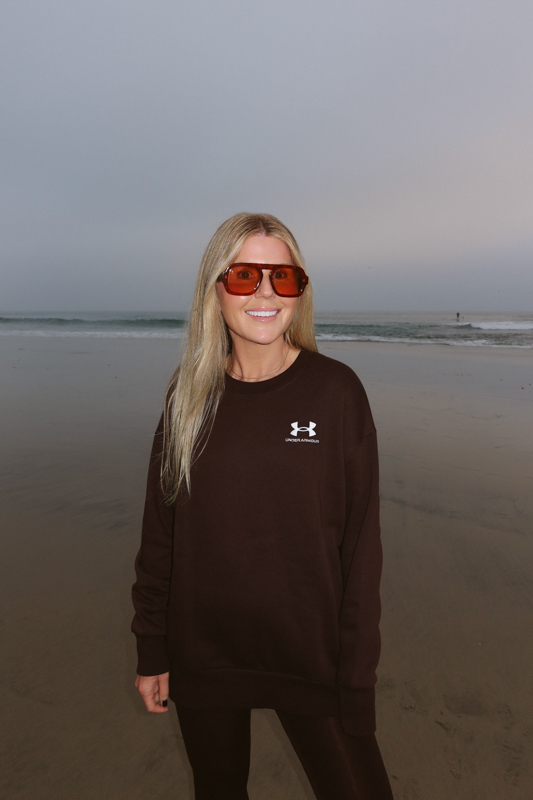 Salty Lashes wearing the Icon Fleece Sweatshirt.